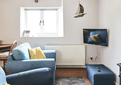 Half Moon Cottage, Furley is a charming single-storey stone retreat nestled in an eight-acre Georgian estate. Perfect for couples seeking tranquillity, it offers exposed stone walls, countryside views, and easy access to the Jurassic Coast.
