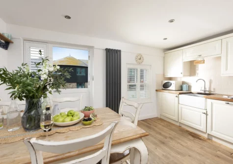 The kitchen & dining area at Happy Days Cottage, St Ives