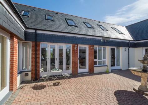 The shared courtyard & outdoor sitting area at Happy Days, Padstow