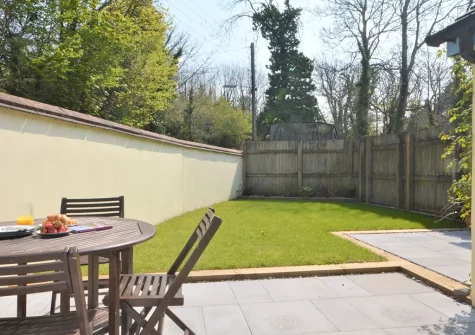 The patio, alfresco dining area & garden at Happy Days, Poughill