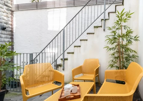 The stone-flagged patio & outdoor sitting area at Harbour Heights, Ilfracombe