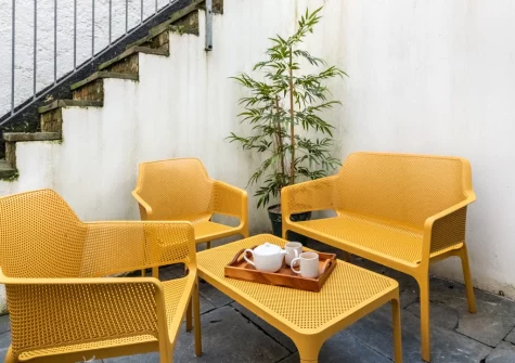 The stone-flagged patio & outdoor sitting area at Harbour Heights, Ilfracombe