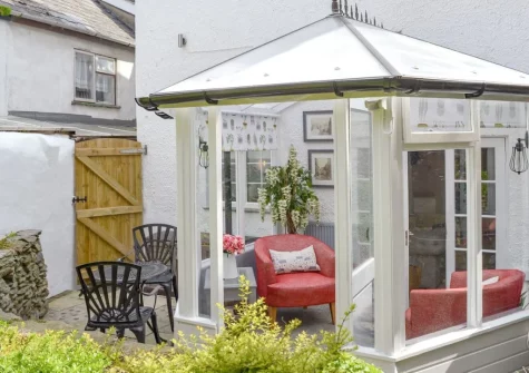 The sunny conservatory & outdoor sitting area at Harbour Hideaway, Ilfracombe