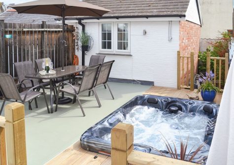The patio & hot tub at Harbour Hideaway, Ilfracombe