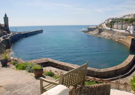 The patio & outdoor sitting area at Harbour Lights, Porthleven