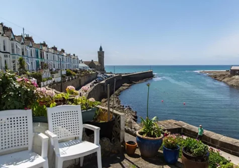 The patio & outdoor sitting area at Harbour Lights, Porthleven