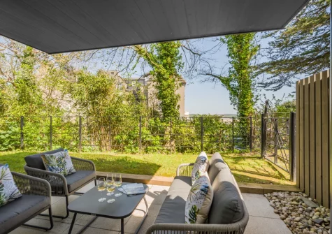 The patio, outdoor sitting area & lawn at Harbour Reach, Padstow