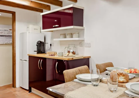 The kitchen & dining area at Harbour's Call, Polperro