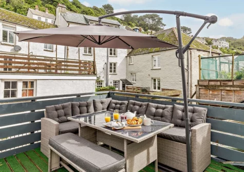 The rooftop terrace & alfresco dining area at Harbour's Call, Polperro