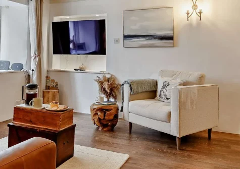 Harbour's Call, Polperro is a charming dog-friendly cottage in this picturesque fishing village. Featuring a rooftop terrace with river views, stylish interiors, and two beautiful bedrooms, it's the perfect base for a memorable coastal holiday.