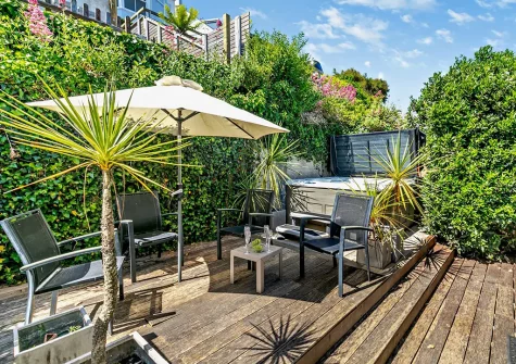 The rear garden, outdoor sitting area & hot tub at Harbour's Reach, Fowey