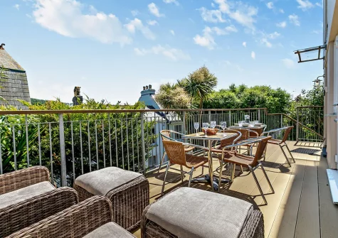 The decked terrace, outdoor sitting & alfresco dining area at Harbour's Reach, Fowey