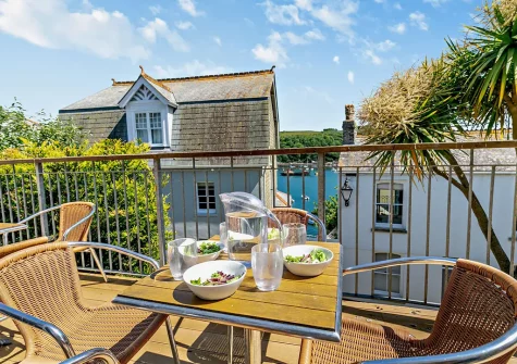 The decked terrace, outdoor sitting & alfresco dining area at Harbour's Reach, Fowey