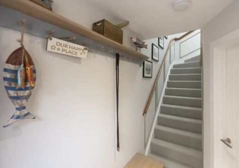 The entrance & stairs up to the first floor at Harlyn Folly, Harlyn