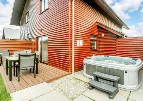 The rear patio, alfresco dining area & hot tub at Harlyn, Retallack Resort & Spa, Winnard's Perch