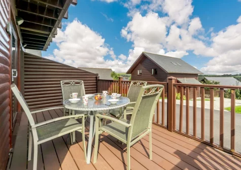 The front decked patio & outdoor sitting area at Harlyn, Retallack Resort & Spa, Winnard's Perch