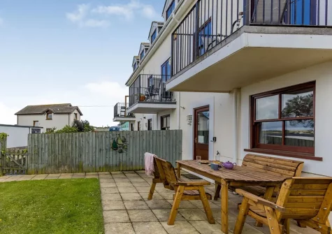 The patio, alfresco dining area & garden at Hartland House, Appledore