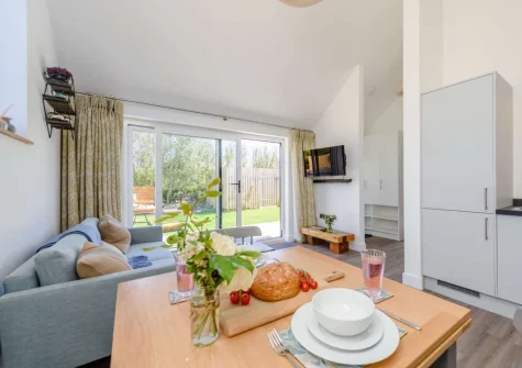 The livingarea, dining area & kitchen at Hartnolls Lodge, Woolacombe