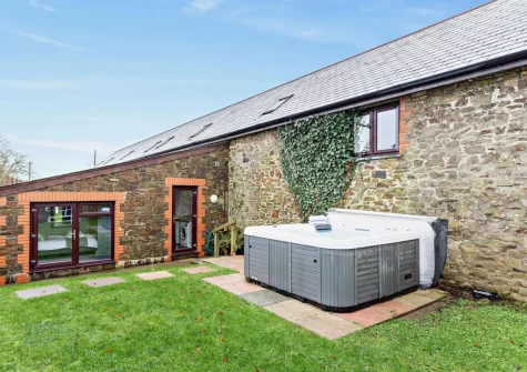 The enclosed garden & hot tub at Hayloft, Arscott, Holsworthy