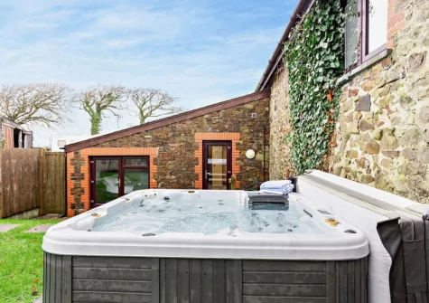 The enclosed garden & hot tub at Hayloft, Arscott, Holsworthy