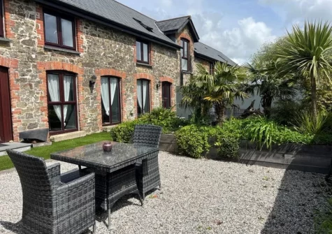 The enclosed garden & outdoor sitting area at Hayloft, Arscott, Holsworthy