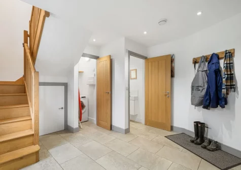 The entrance hallway & stairs up to the first floor at Hayloft at Trevissick Farm, Porthtowan