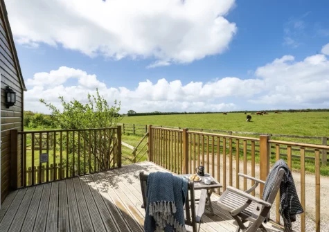 The decked balcony & outdoor sitting area at Hayloft at Trevissick Farm, Porthtowan