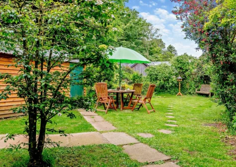 The enclosed garden & alfresco dining area at Haytor Vale Lodge, Haytor
