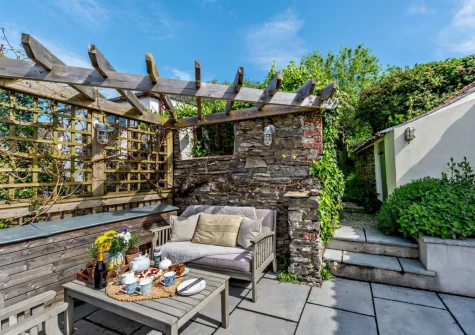 The raised patio & outdoor sitting area at Heanton Cottage, Braunton