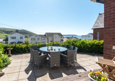 The south-facing patio & alfresco dining area at Heather Lea, Woolacombe