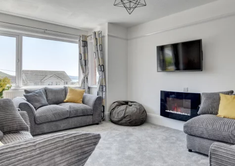 Heather Lea, Woolacombe, is a grand five-bedroom retreat set in mature grounds, just steps from the famous three-mile beach. Enjoy coastal views, a sun-drenched south-facing patio, and ideal space for large family gatherings and special celebrations.