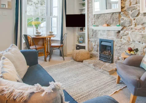Hebe Cottage, St Ives is a characterful two-bedroom retreat in the heart of this artistic haven, boasting panoramic sea views to Godrevy Lighthouse, cosy period features, and a sunny courtyard, with beaches and galleries half a mile away.