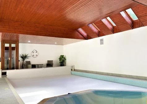 The indoor swimming pool & hot tub at Heddon Valley Farmhouse, Killington