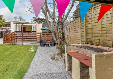 The barbecue, alfresco dining & enclosed garden at Here Tiz, St Day