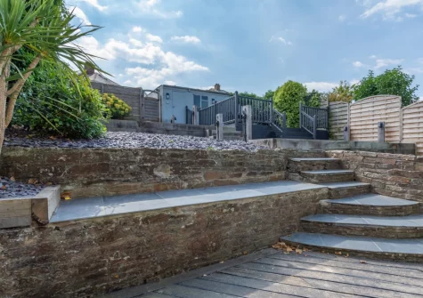The tiered garden, decked patio & alfresco dining area at Heyl Sound, Padstow