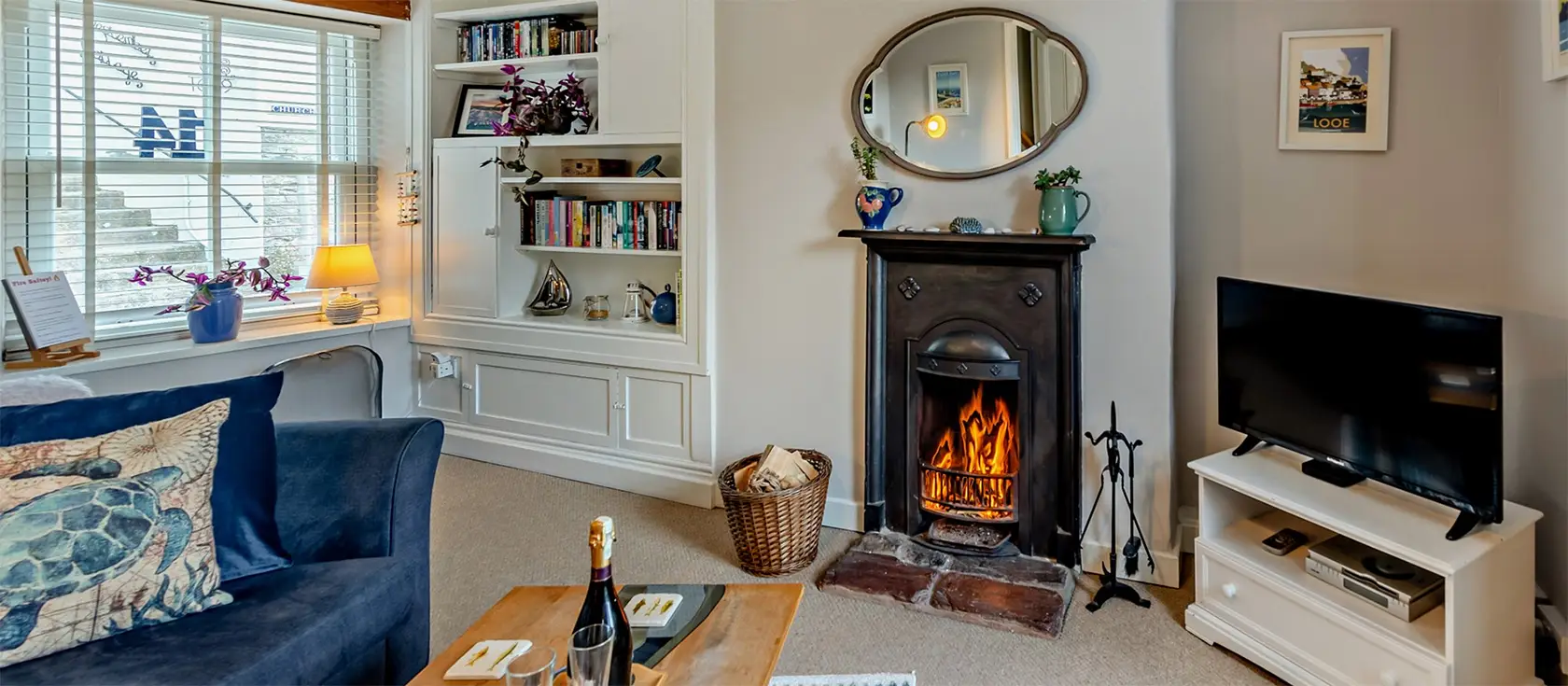 Hideaway Cottage, Brixham is a traditional fishermen's cottage with boutique-hotel styling, featuring a sumptuous king-size bedroom, cosy open fire & private garden, just minutes from the vibrant harbour – the perfect romantic retreat for couples.