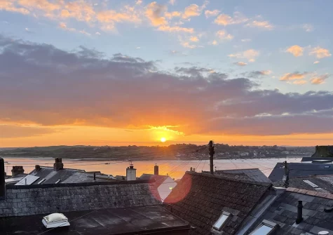 Enjoy incredible sunset views from bedroom #1 atHideaway Cottage, Padstow