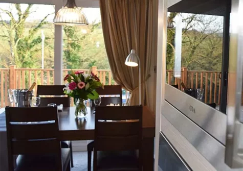 The dining area at Hideaway Lodge, Bossiney