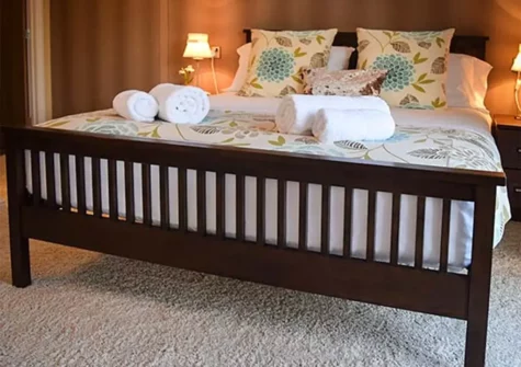 Bedroom #1 at Hideaway Lodge, Bossiney