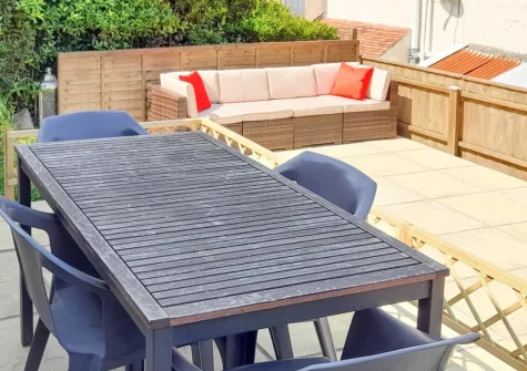 The patio garden & alfresco dining area at High Tide, Combe Martin