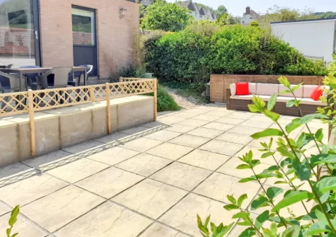 The patio garden, alfresco dining & outdoor sitting area at High Tide, Combe Martin