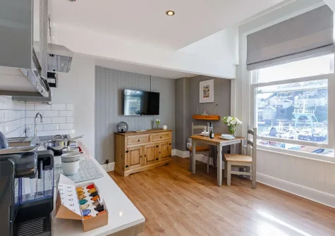 The open-plan kitchen & dining area at High Tides, Brixham