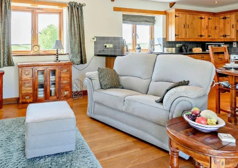 High View, Crumplehorn is a beautifully converted barn set in a peaceful hilltop location with countryside and sea views, just 2 km from Polperro's fishing village charm, featuring reverse-level living, a spa bath, and shared farmland to explore.