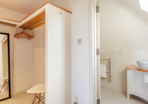 Bedroom #1 & en-suite bathroom at Higher Close, Mawgan Porth