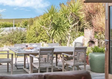 The decked patio & alfresco dining area at Higher Close, Mawgan Porth