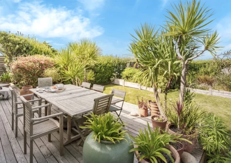 The decked patio & alfresco dining area at Higher Close, Mawgan Porth