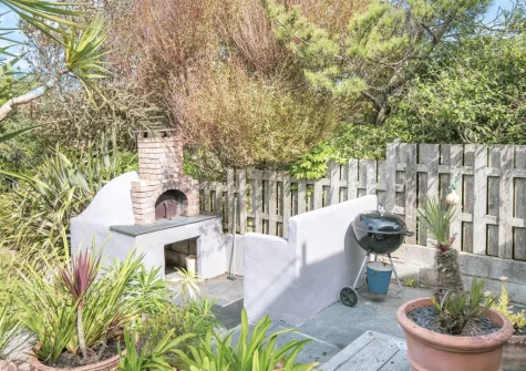 The patio, pizza oven & barbecue area at Higher Close, Mawgan Porth
