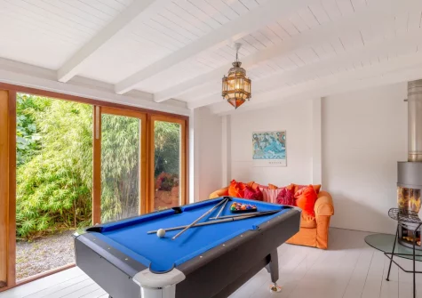 The detached eco games room in the garden at Higher Close, Mawgan Porth