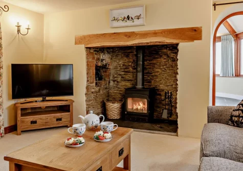 The cozy snug at Higher Hodges Farmhouse, Combe Martin