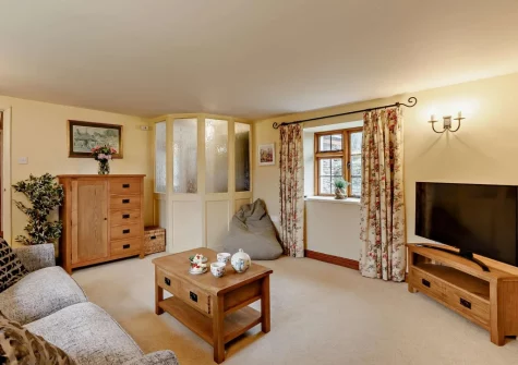 The cozy snug at Higher Hodges Farmhouse, Combe Martin